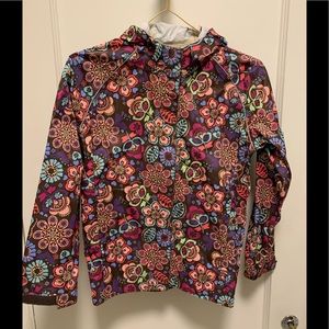 REI rain jacket Girls size 10-12 waterproof with hood. Pretty print.